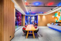โรงแรม Ibis ทะเลสาบนกยูง สิบสองปันนา - โรงแรมราคาถูก