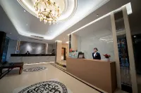 Kana Business Hotel (Zhanjiang Haitian Park Yingzhan Holiday Plaza)