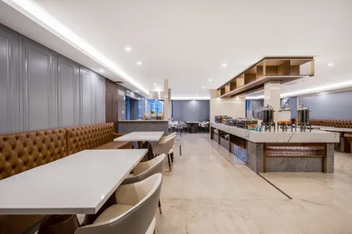 Pu Jue International Hotel (Shanghai Songjiang Xin Qiao) Питание Photos