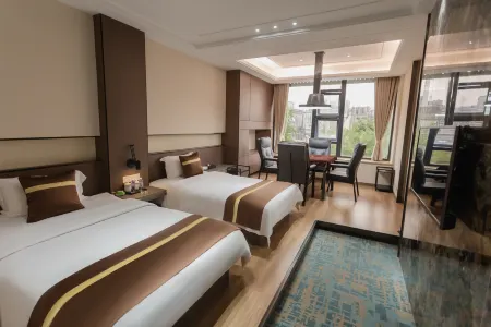 Qida Hotel Отели рядом с достопримечательностью «Quxian Confucian Temple»