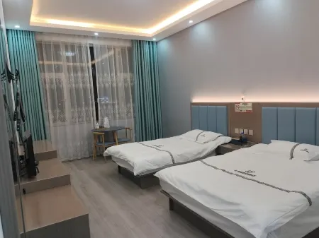 Yongsheng Qixi Hotel Отели в г. Юншэн