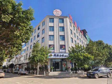 Qianyuan Hotel, Luxi Отели в г. Луси