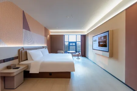 Orange Hotel (Wanda Plaza Branch of Anyang Municipal Government) Отели в г. Аньян