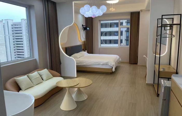 Xinxin Homestay (Yifeng Shidai Square)
