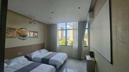 Wuchuan Yuanmeng Hotel Отели в г. Вучуань