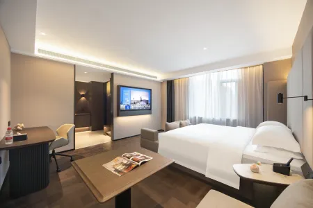 TingLan Hotel(Benxi Huanren Music Fountain Branch) Отели рядом с достопримечательностью «Minzu Square»