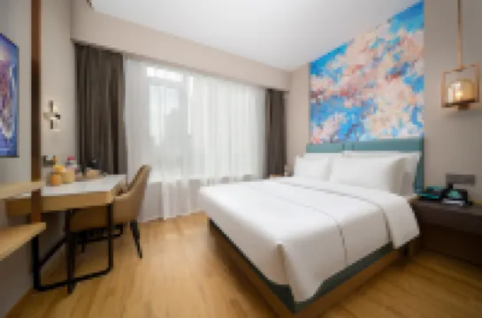 Magnolia Business Hotel (Qingdao May Fourth Square Hisense Plaza Branch) Hotels in Qingdao