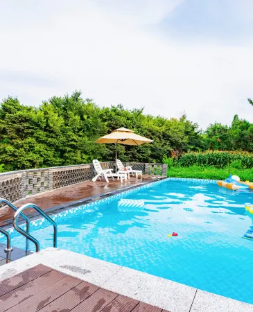 Floral Hotel · Liyang Qishan Hotel (Nanshan Bamboo Sea Store) Отели рядом с достопримечательностью «Pingqiao Stone Dam»