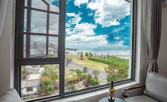 Zaihaiyifang Sunrise Seaview Homestay (Dali Qihai Branch)