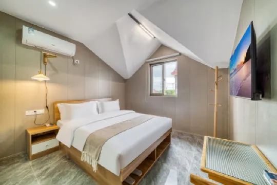 Baojia·Self-service B & B (Hongqiao Hub Beixincun Xinlian Branch) Отели рядом с достопримечательностью «Xinshang Life Square»