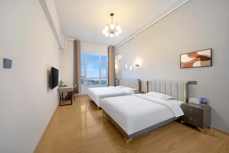 Changchun Yicheng Huayi Shopping Plaza Jusen Hotel Отели рядом с достопримечательностью «Changchun Workers Gymnasium»