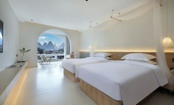 Yangshuo Antiya Hotel (Yulonghe Shili Gallery Store)