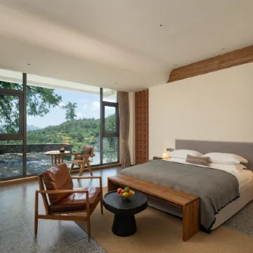 Jianglu Fengchuiyuntai HOTEL Отели рядом с достопримечательностью «Laolongdong Scenic Area»