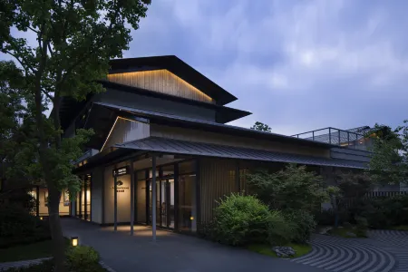 Qianli Zou Danqi Ganlushan Homestay (Wuhan Ganlushan Wenchuangcheng) Отели рядом с достопримечательностью «Mulan Grassland»