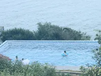 Qingdao  Boya Yueqi Seaview Hotel - สระว่ายน้ำแบบอินฟินิตี้