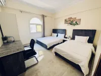 Orange Chinese Hotel Отели рядом с достопримечательностью «Канадский международный колледж - CIC»