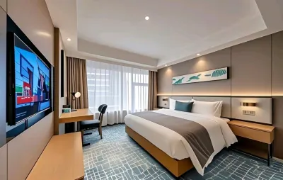 Suqian Yunlan Manju Hotel (Baolong Plaza Bus Terminal) Отели рядом с достопримечательностью «Школа Старших кафедральных учителей»