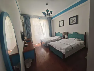 Luoping Huaying Image Theme Inn