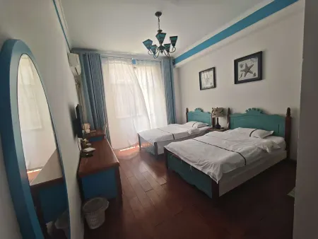 Luoping Huaying Image Theme Inn Отели в г. Луопинсянь