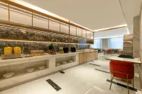 White Magnolia Business Hotel (Linxia Peony Square Branch) - servizio colazione