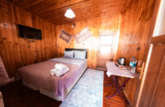 Abant Barış Pansiyon offers peaceful stay in nature with traditional village breakfast.