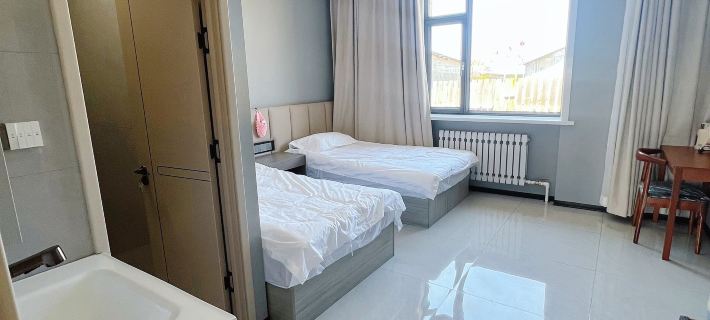 My Home Quadrangle Inn Homestay โรงแรมในหูหม่า