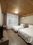 Huaxi·Longmen Manor Hotel (Longmen Grottoes Northwest Service Area Longmen High-Speed Rail Station) - 3 ดาว