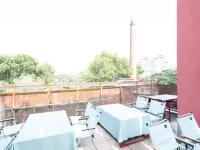 華逸輕宿飯店（ 鄭州記憶油化廠創意園店） 海滩寺附近的飯店