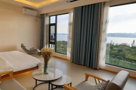 Fuxian Lake Yuyuan Yaju Chinese Inn Отели рядом с достопримечательностью «Fuxian Lake Shijia Cherry Blossom Garden»