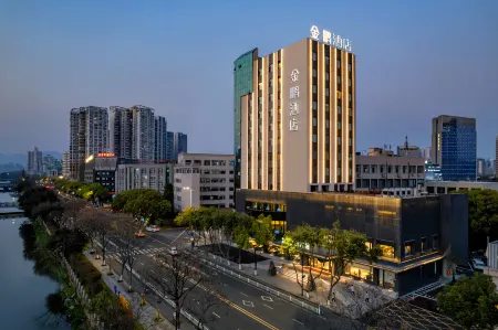 Jinpeng Hotel Отели рядом с достопримечательностью «Wenzhou Vocational College of Science & Technology (West to Wenzhou Bureau of Land and Resources Lucheng Branch)»
