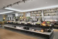 Pu Yue Boutique Hotel (Wuhan Zhongnan Road Metro Station) - servizio colazione