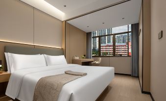 Yiyang Qianyi Hotel (North Branch of City College)