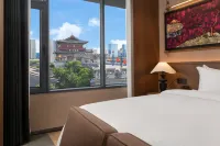 Luoshen Bronze Magpie Hotel (Luoyang Yingtianmen Branch) Hotels near Longmen Grottoes