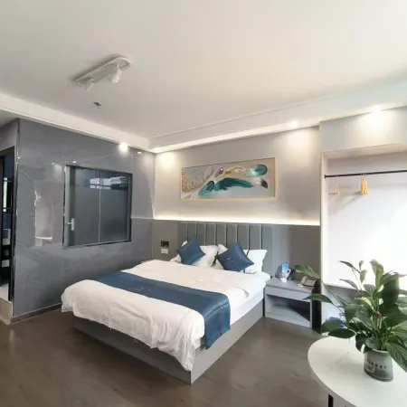 Napo Huapeng Business Hotel