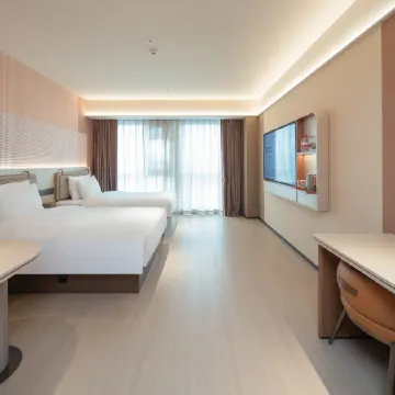 Orange Hotel (Leshan High-speed Railway Station Shihao Plaza)