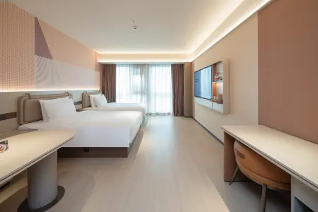 Orange Hotel (Leshan High-speed Railway Station Shihao Plaza)