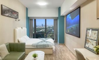 Zhongshang Yiju Sports Theme Cinema Apartment (Nanjing South Railway Station North Square)