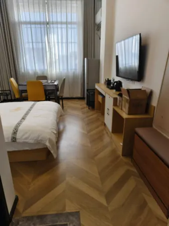 Yueke Inn Отели в г. Даву