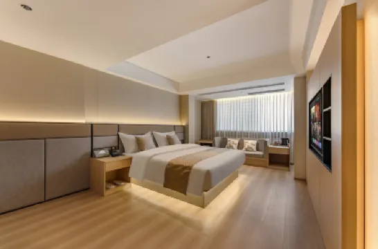 Di Feng Hotel (Xilangkengkou Subway Station Branch) Hotel berhampiran Guanggang Workers' Stadium