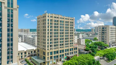 Home lnn (Shengzhou Wuyue Plaza Guanhenan Road Branch) Отели рядом с достопримечательностью «Huju Zoo»