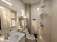 Binchuan Xinjing Hotel