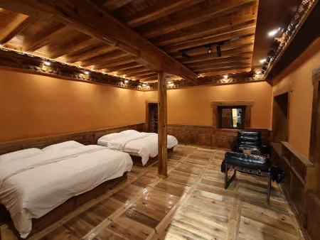 Kangding Lianhahu Qiushengju Chinese Inn Отели рядом с достопримечательностью «Lotus Sea»