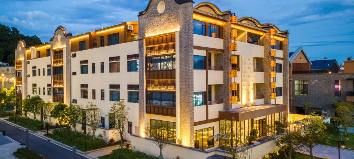 Douzhou Courtyard Hotel (Maoming Xinyi Douzhouli Cultural and Creative Street) โรงแรมในซินยี่