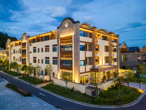 Douzhou Courtyard Hotel (Maoming Xinyi Douzhouli Cultural and Creative Street) Hôtels à : Xinyi