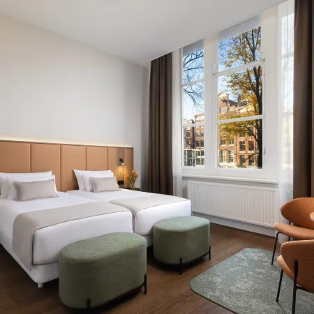 NH City Centre Amsterdam Отели рядом с достопримечательностью «Плавучий дом-музей»