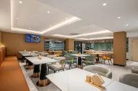 White Magnolia Hotel (Luoyang Xiaojie Tianfu Wangcheng Park Subway Station Branch) - فطور