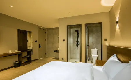 Jinyue Business Hotel Отели в г. Эшань