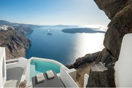 Aqua Luxury Suites Отели в г. Санторини