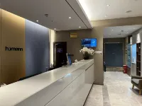 Yijia Hotel (Xinyi Railway Station Nanjing Road)
