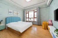 Dalian south China Plaza Hotel apartment - Condos